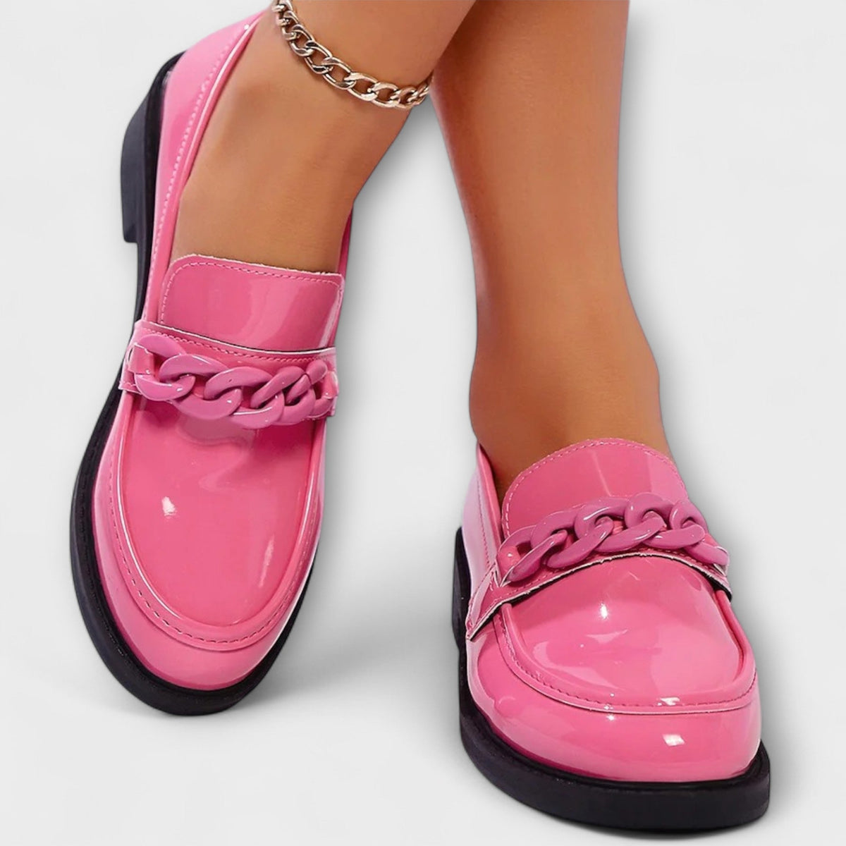 Delia chain loafers in pink, worn front view