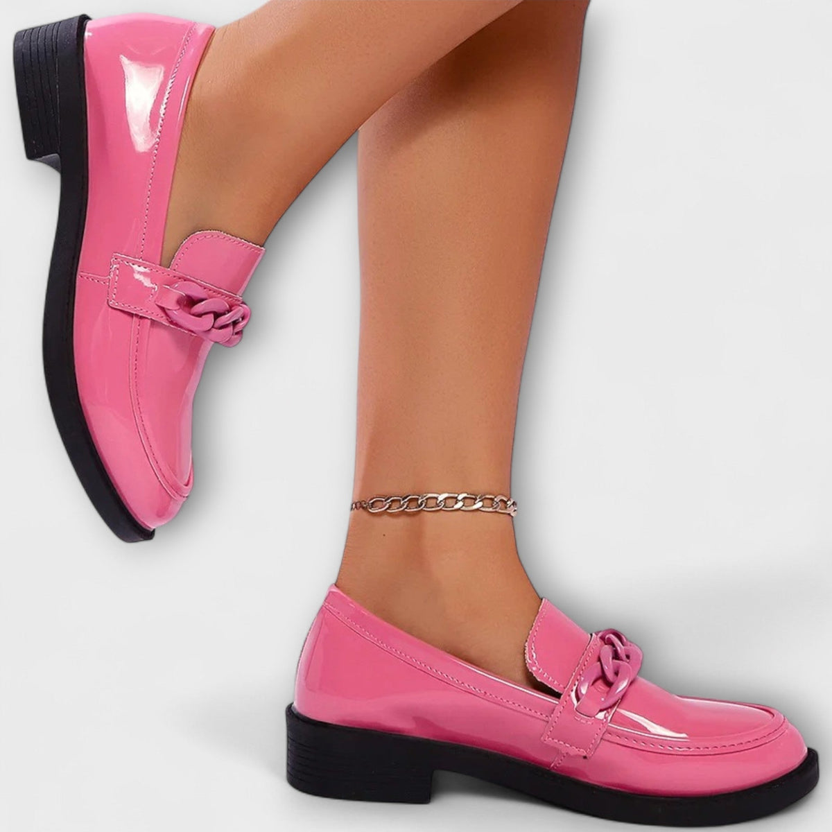 Delia chain loafers in pink, worn side view