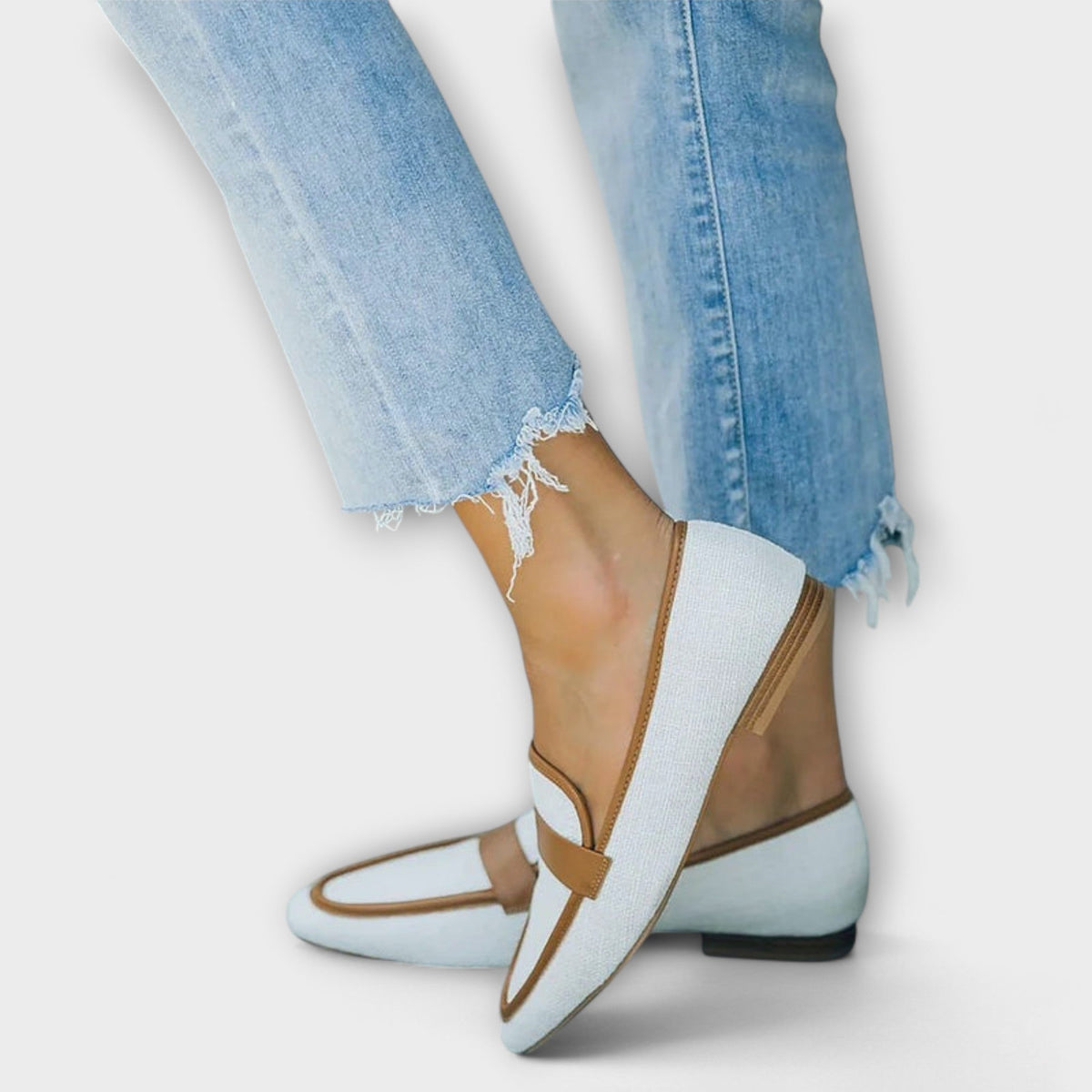 Bianca loafers in ice blue, side view showing low stacked heel