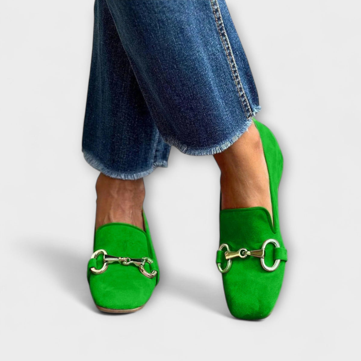 Fiona loafers in green with silver snaffle detail, worn with cropped jeans