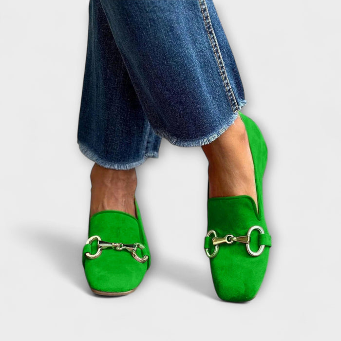 Fiona loafers in green with silver snaffle detail, worn with cropped jeans