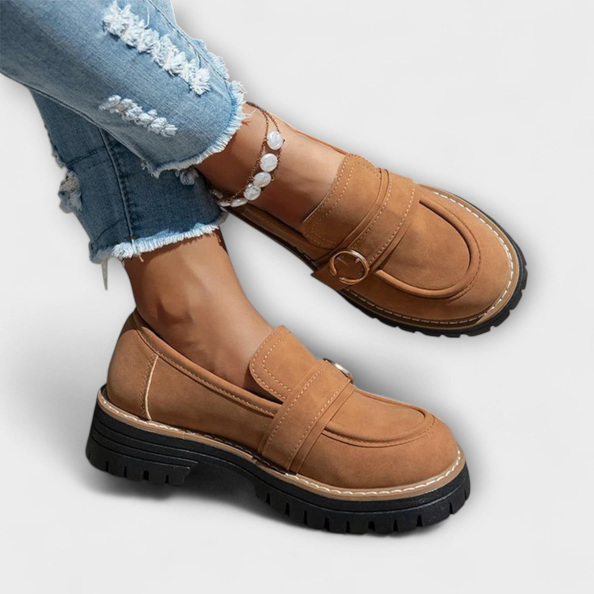 Aurora casual loafers in brown worn with jeans, front view