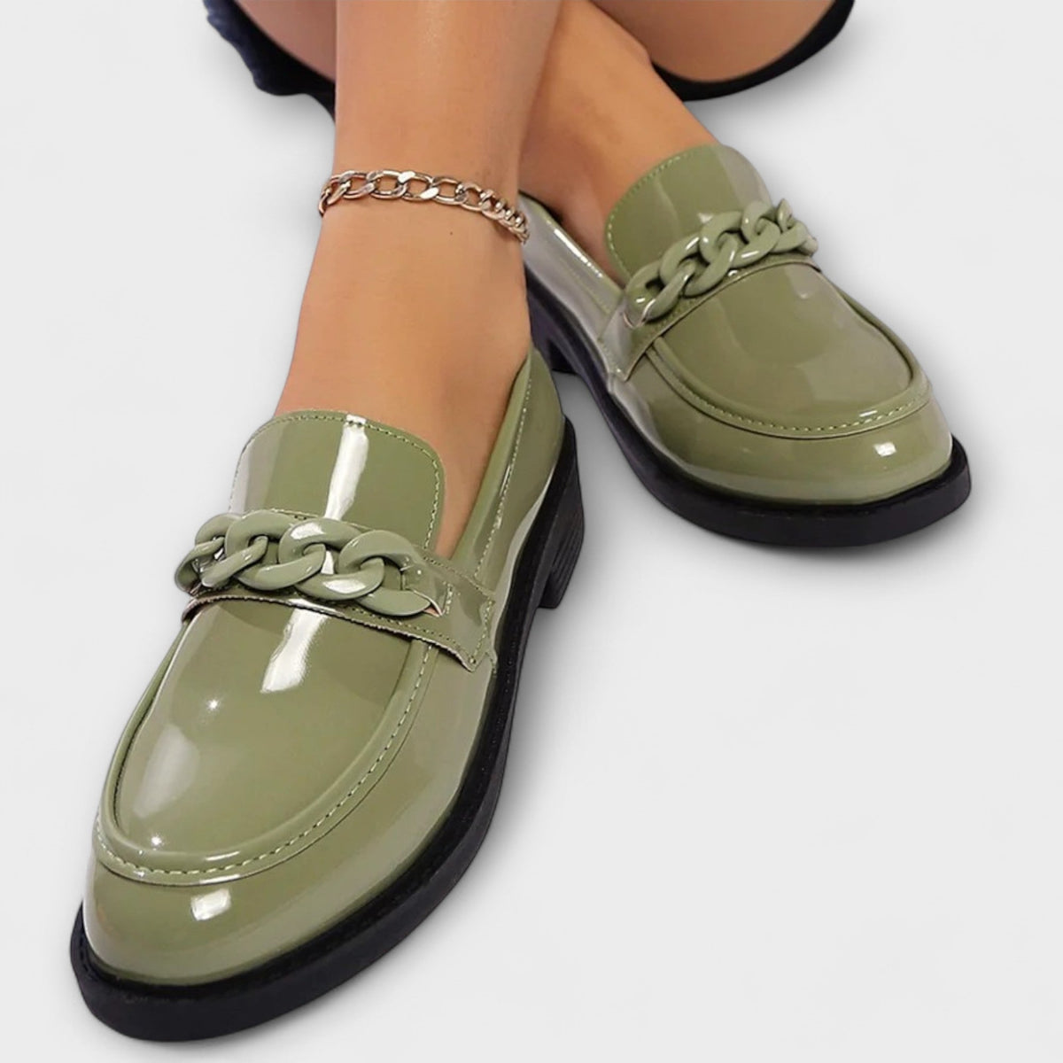 Delia chain loafers in green, close-up of chain detail