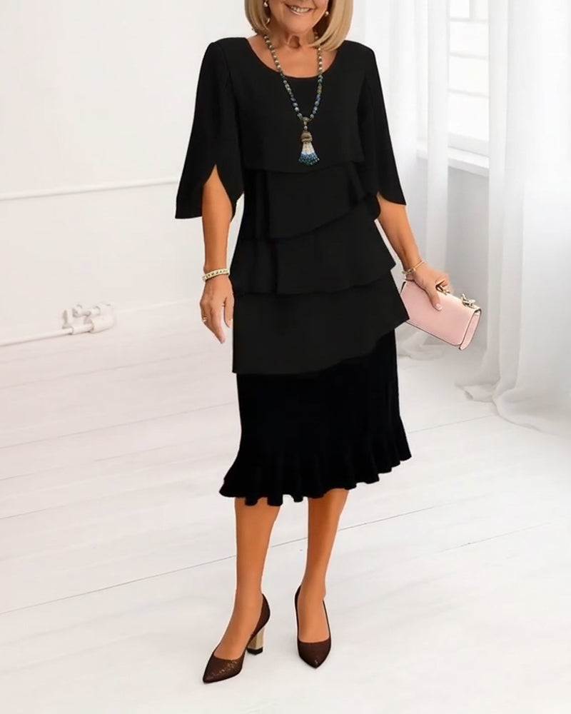 Charlotte tiered ruffle midi dress in black, standing front view