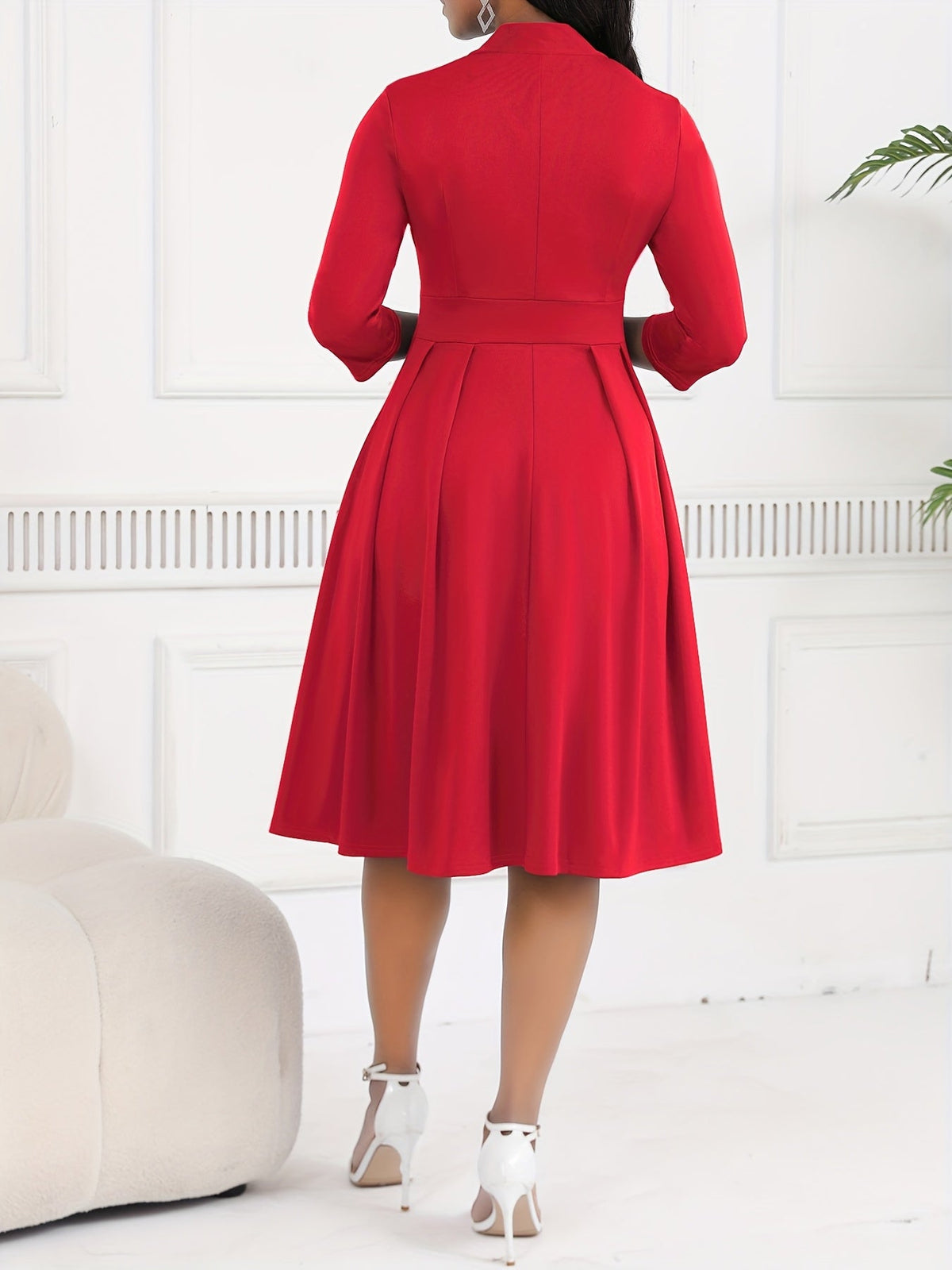 Olivia tie-waist midi dress in red, back view of pleated skirt