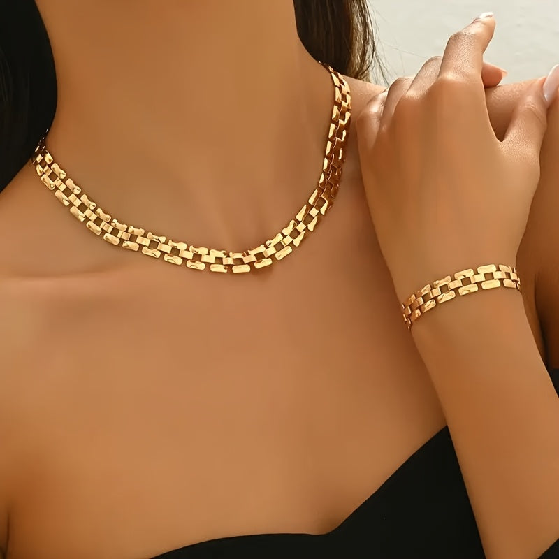 Square buckle necklace and bracelet set in gold, worn on neck and wrist