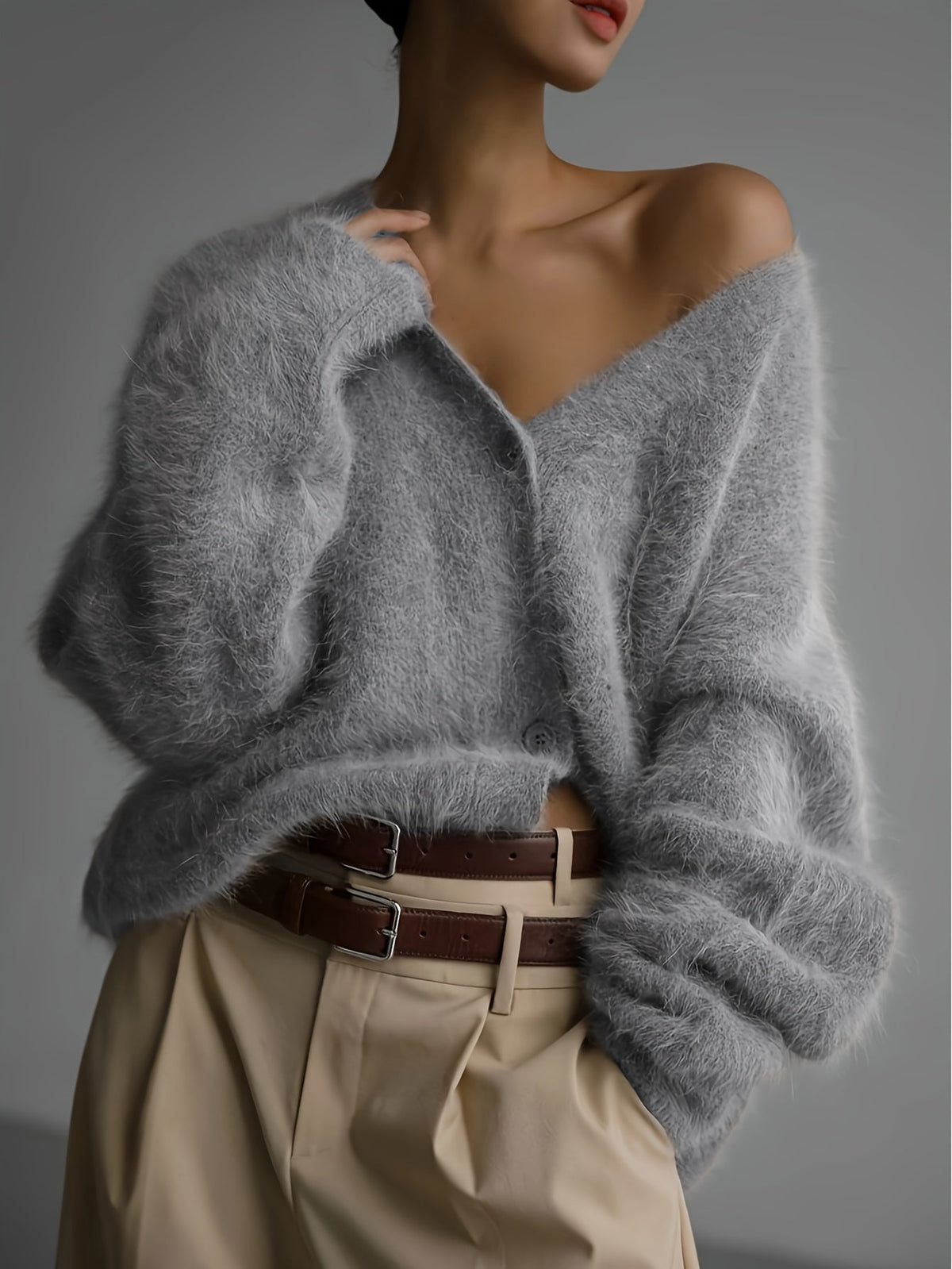 Seriavi V-neck cardigan in grey, front view on model