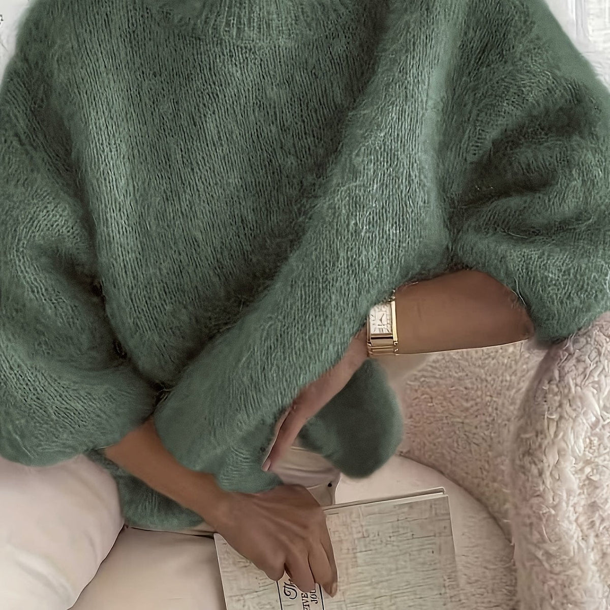 Ember crew neck sweater in army green, seated side view