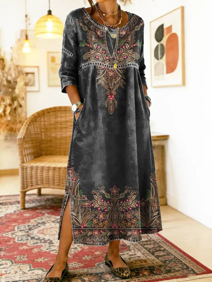 Antonia printed maxi dress in black, full-length front view with floral border print
