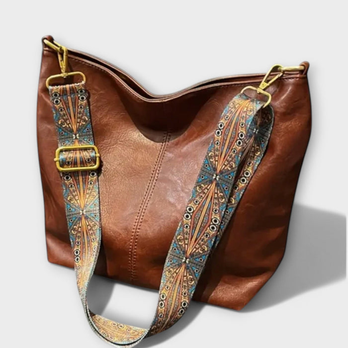 Agatha vintage shoulder bag in brown with patterned strap, front view