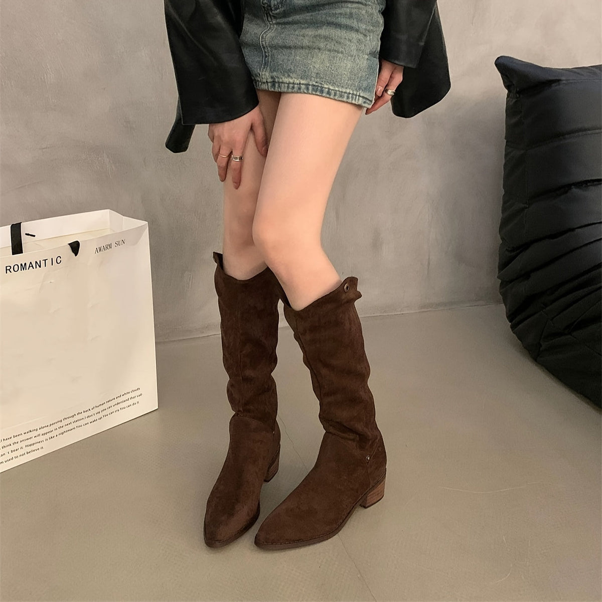 Evadne V-shape long boots in dark brown, tall shaft, front view on model