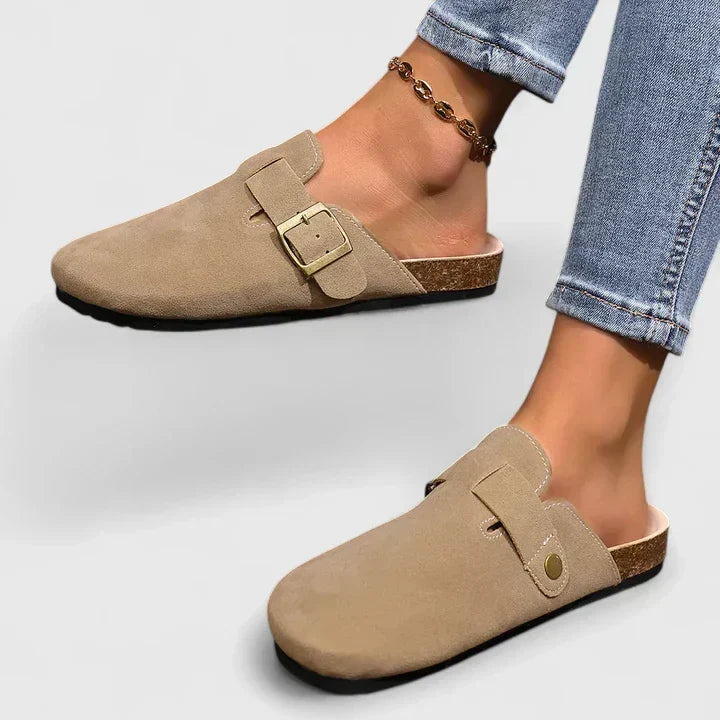 Katrien mocha backless loafers worn with jeans, front view