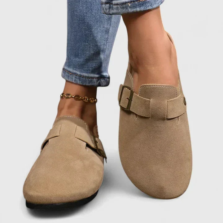 Katrien loafers in mocha worn with cuffed jeans, side view