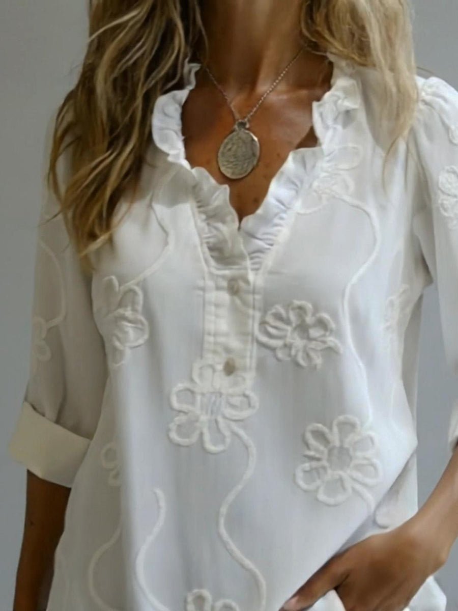 Amelia embroidered blouse in white, detail of floral embroidery and placket