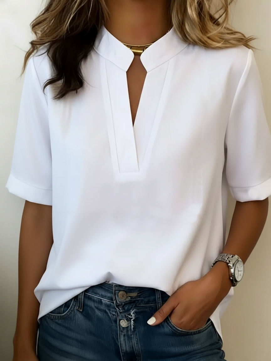 Margaux V-neck blouse in white, front view worn with jeans