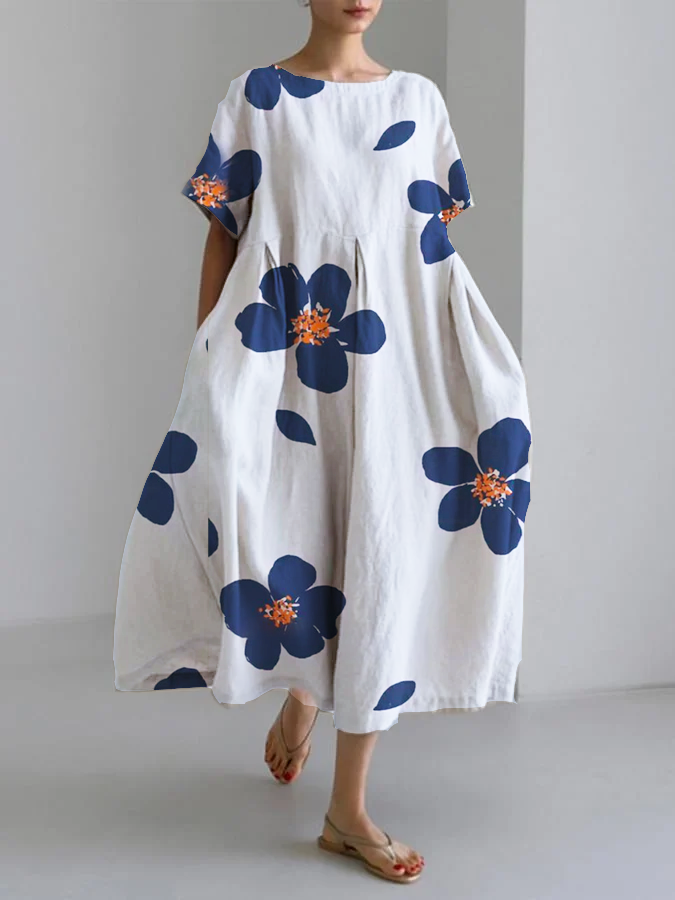 Mirabel floral summer dress in white with blue blooms, full-length front view