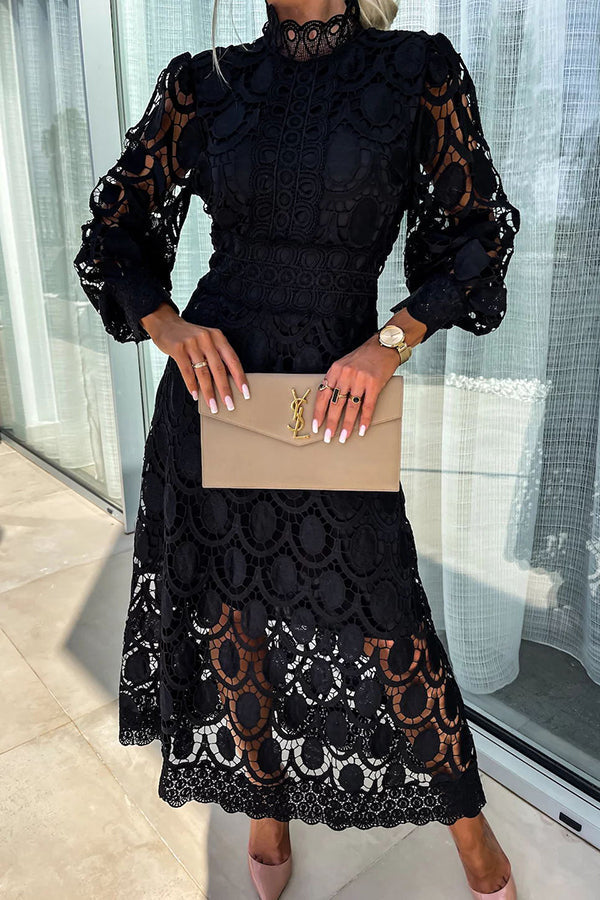 Liza romantic lace dress in black, front view with clutch