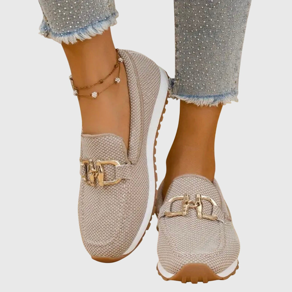 Shiloh orthopaedic loafer trainers in beige, worn with jeans, front view