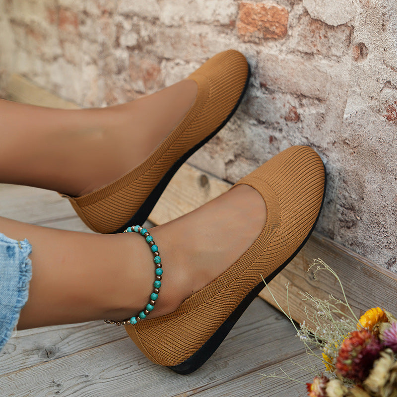 Anna knitted slip-on shoes in camel, worn side view