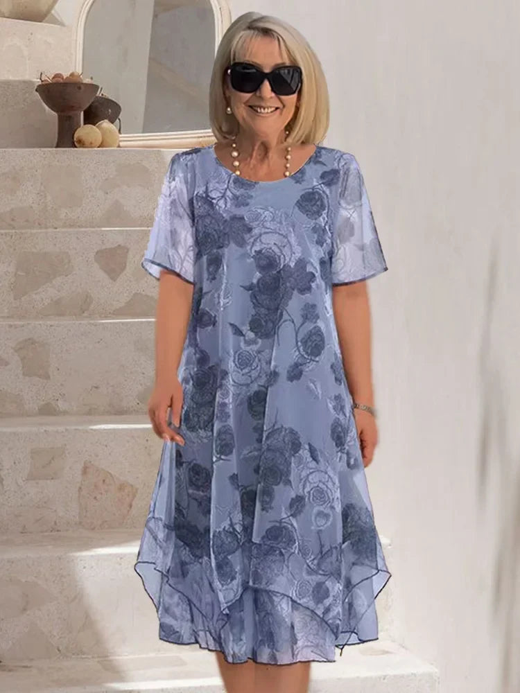 Margot pleated floral midi dress in blue, full front view