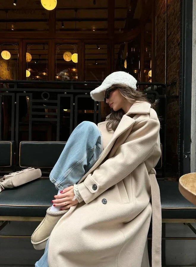 Lyna long winter coat in light khaki, three-quarter side view