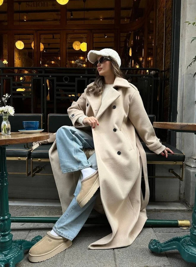 Lyna long winter coat in light khaki, full front view worn open with belt