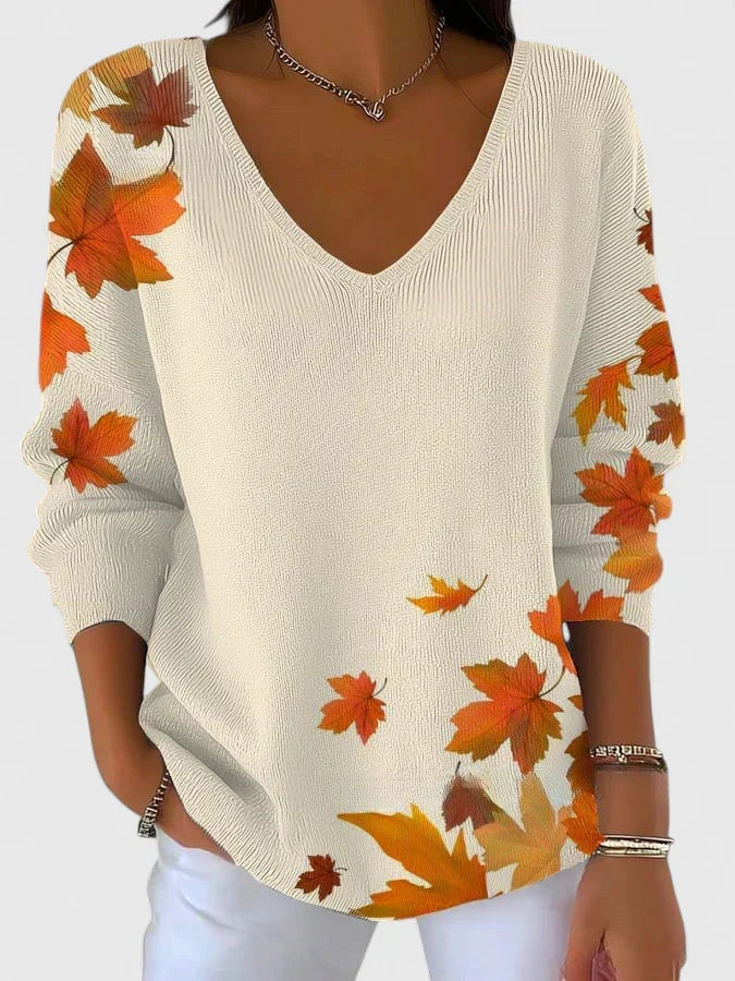 Vianne V-neck sweater in white with autumn leaf print, front view
