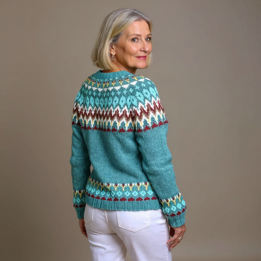 Seraphina Icelandic cardigan in teal, back view showing patterned yoke and hem