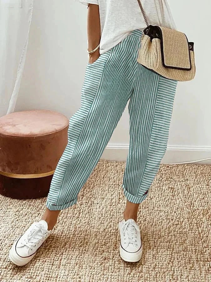 Cosette striped trousers in green and white, full-length front view