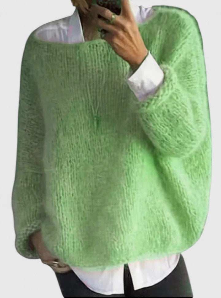 Jozelyn sweater in green, styled with a white shirt, front view