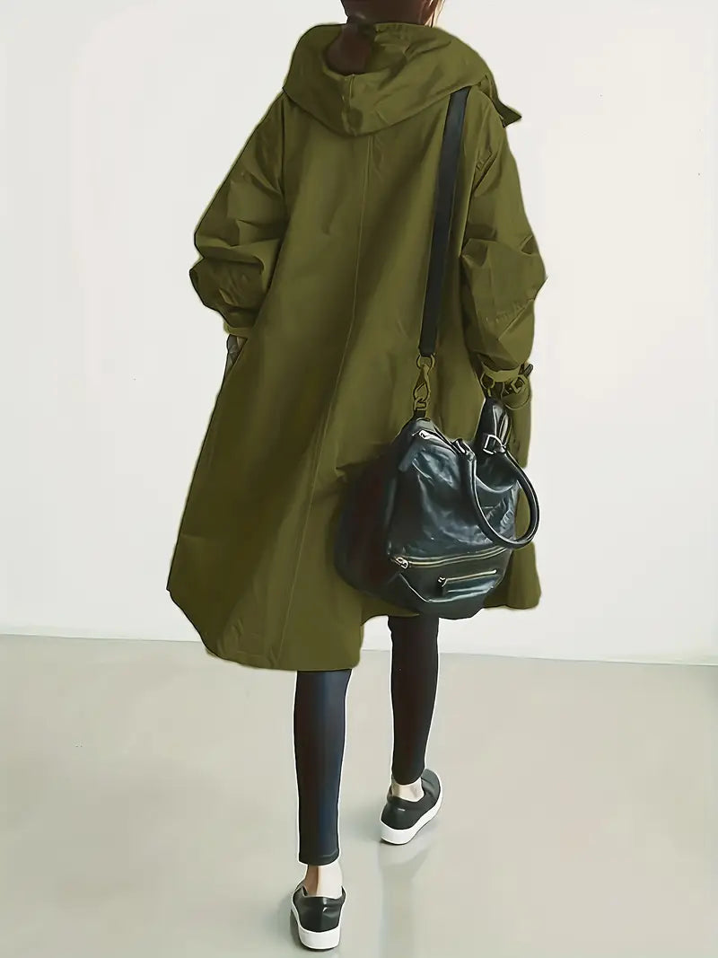 Callindra trench coat in army green, back view with curved hem