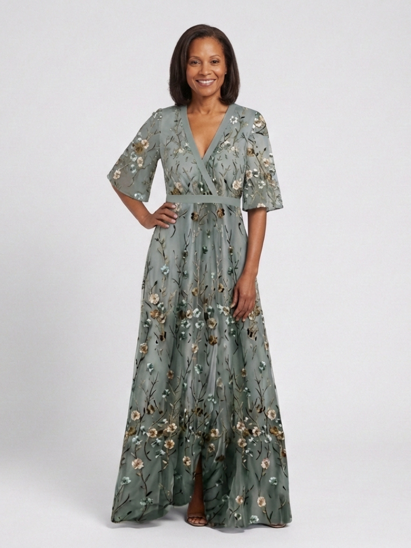 Evadne floral maxi dress in sage green, front view with flowing skirt