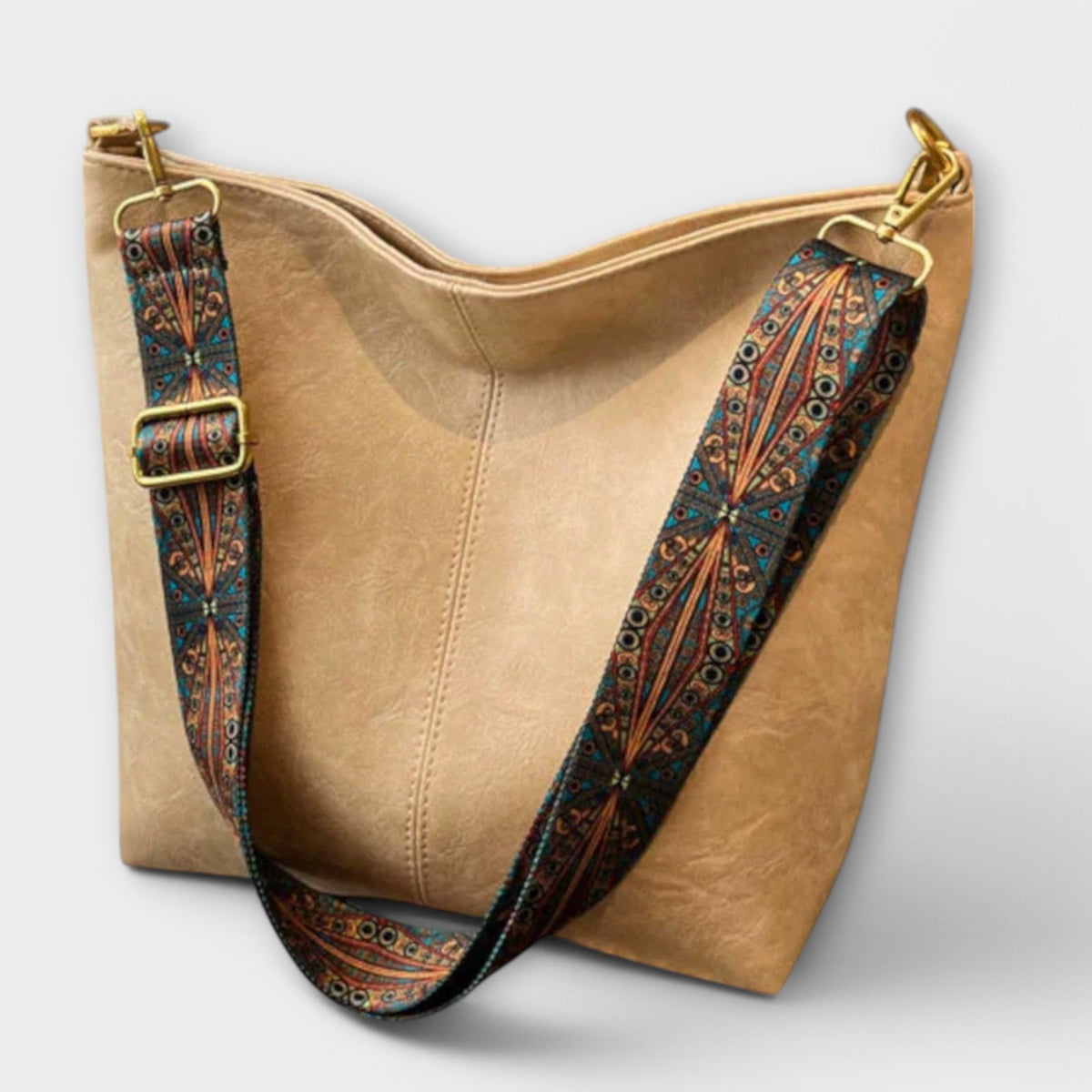Agatha vintage shoulder bag in beige with patterned strap, front view