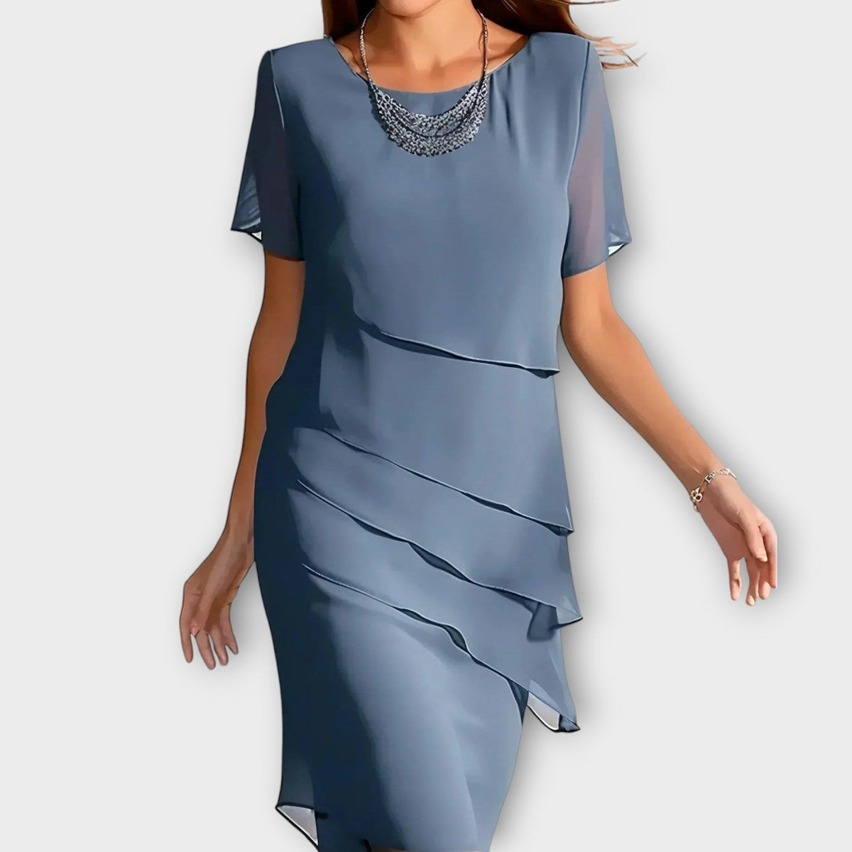 Tessa tiered layered dress in blue, front view with flutter sleeves
