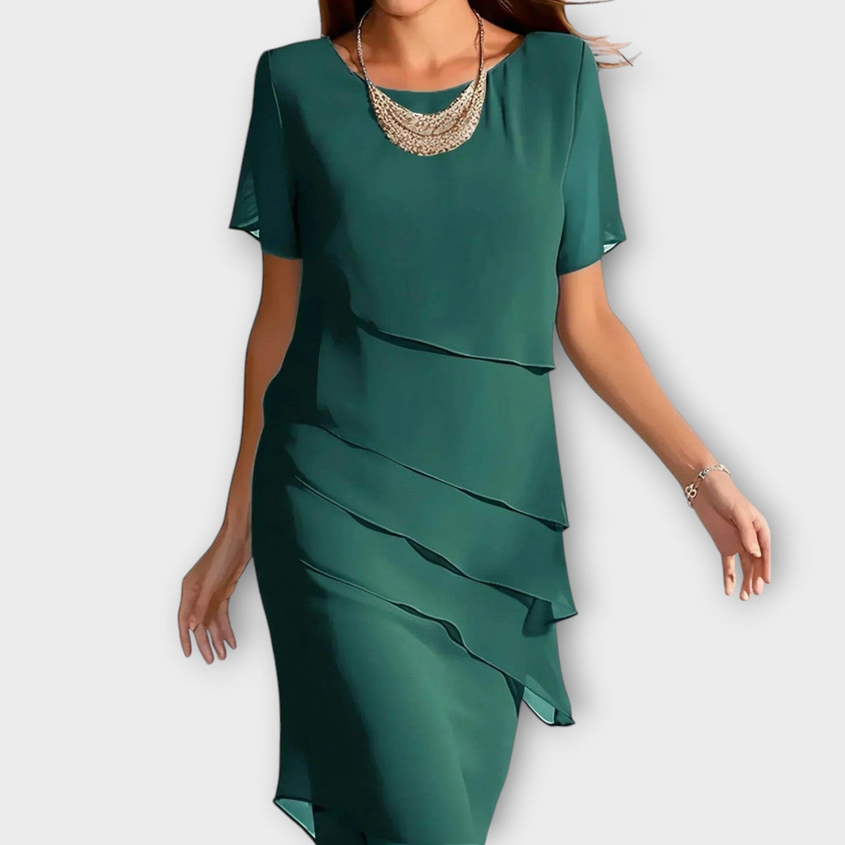 Tessa tiered layered dress in green, front view on model