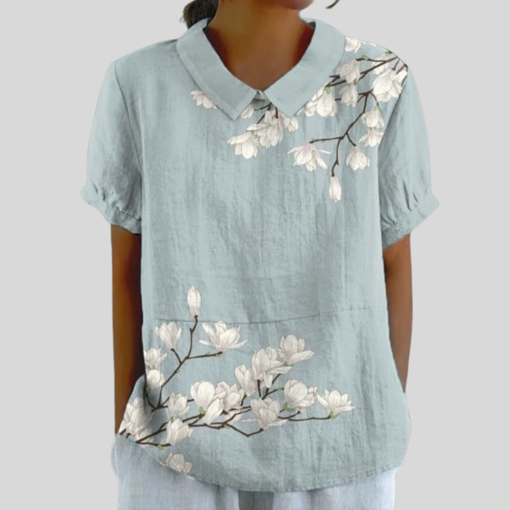 Rosemonde collared blouse in dusty blue with white magnolia print, front view