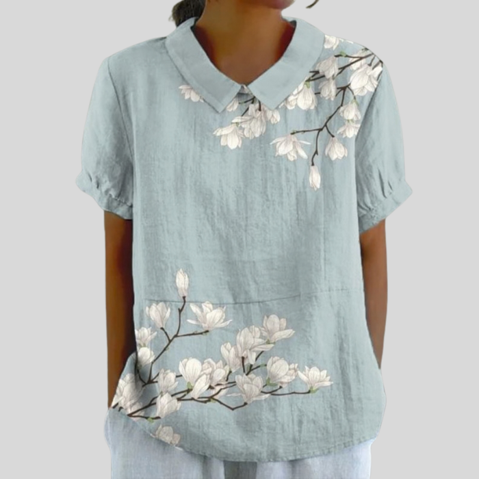 Rosemonde collared blouse in dusty blue with white magnolia print, front view