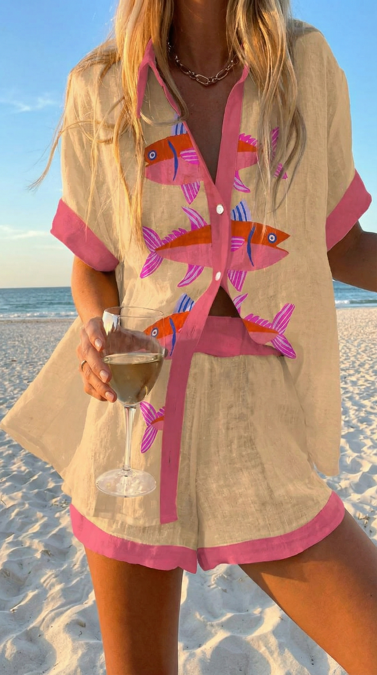 Capri summer co-ord set in sand beige with painted fish print and fuchsia trim, front view