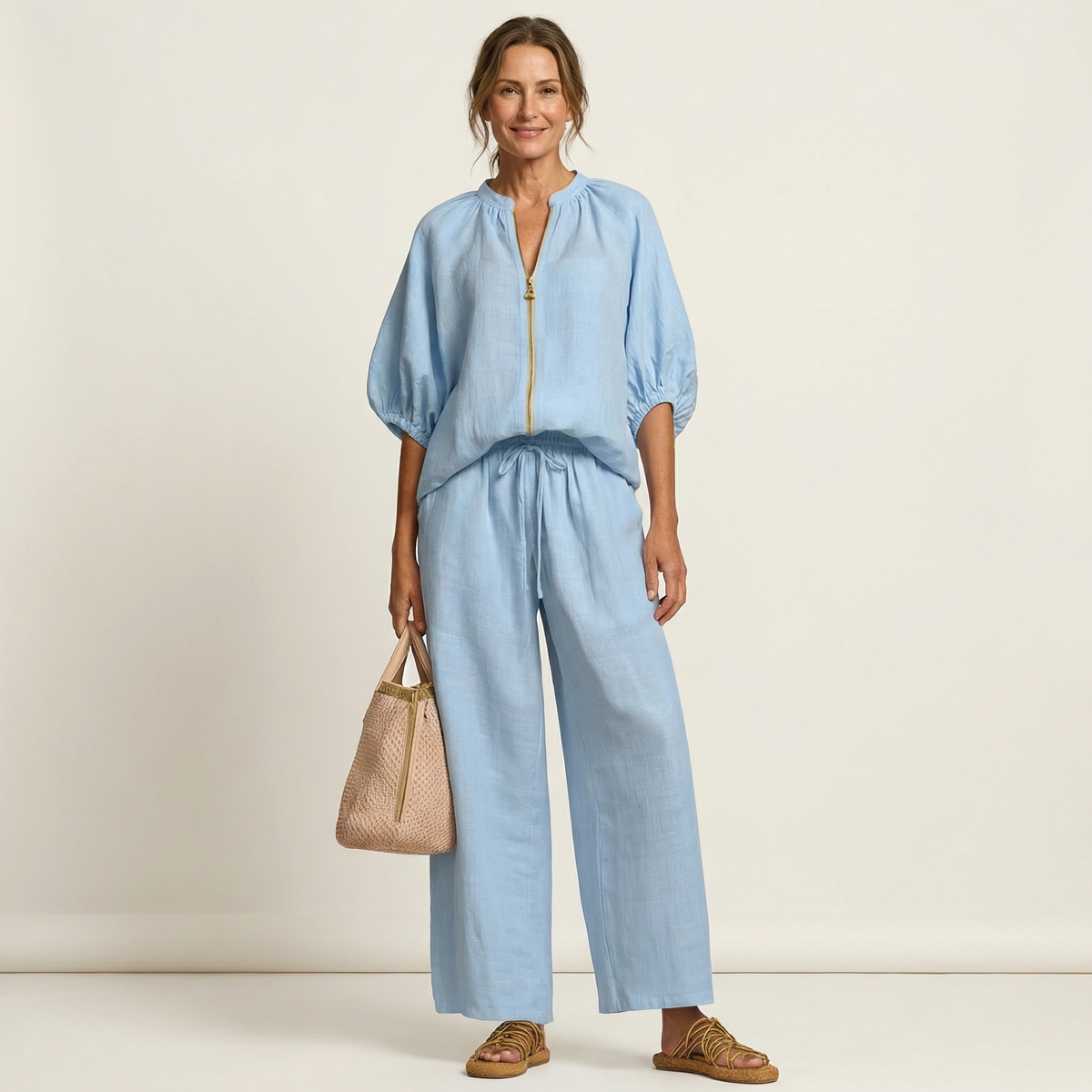 Marlowe zipper-front puff sleeve set in light blue, full-length front view