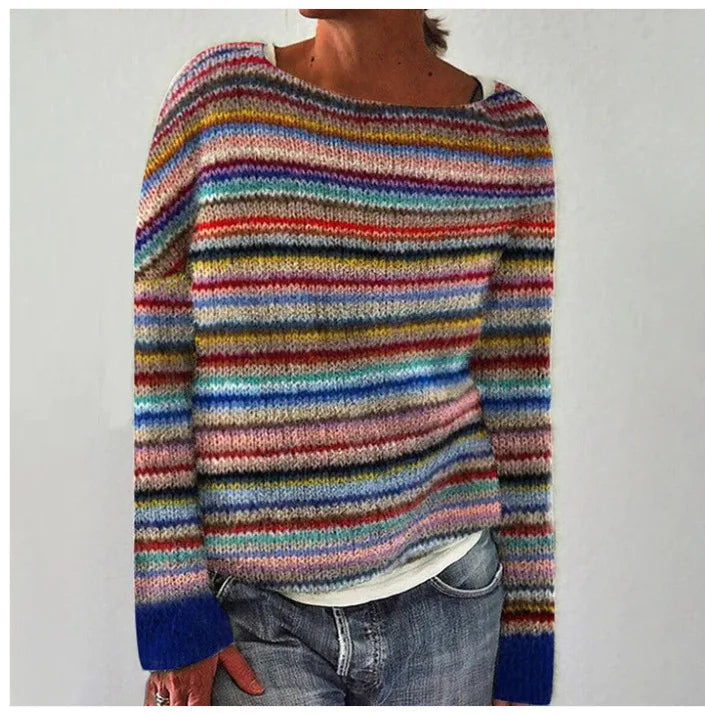 Aurielle vintage knit sweater in rainbow stripes, front view with denim