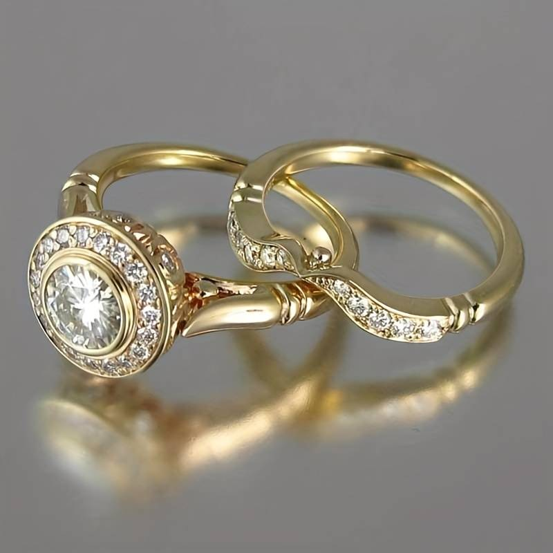 Gold and zirconia ring pack, halo stone ring with curved pave band