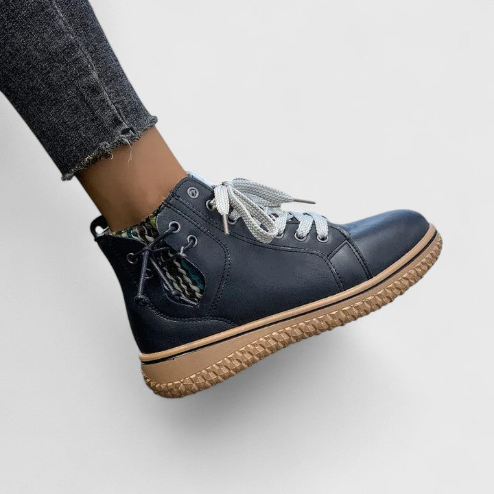 Brilly ankle boot in black, close-up side view showing laces and sole