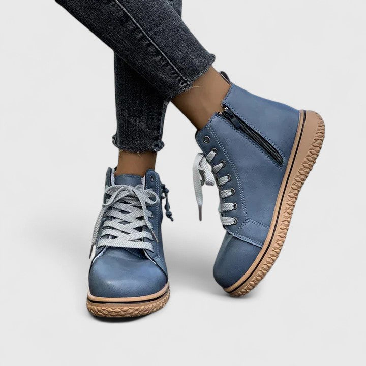 Brilly ankle boots in blue, side view showing zip fastening