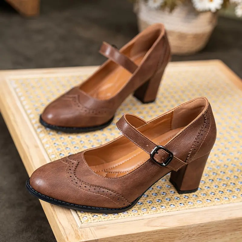 Dorka Mary Jane heels in brown, pair on wooden stand