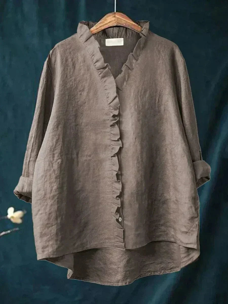Thalia ruffled blouse in dark grey, front view on hanger