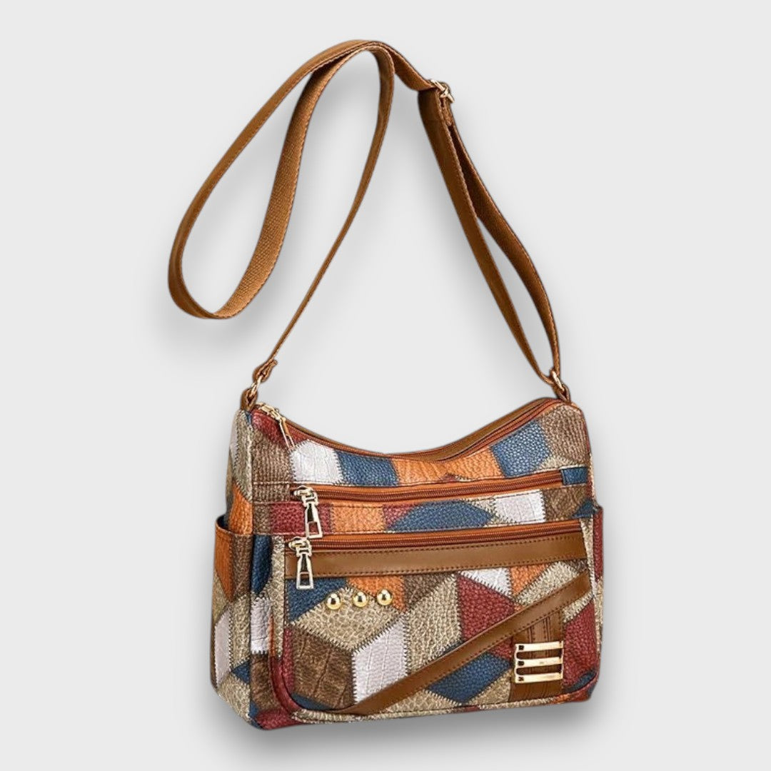 Maria patchwork shoulder bag from above with strap laid out
