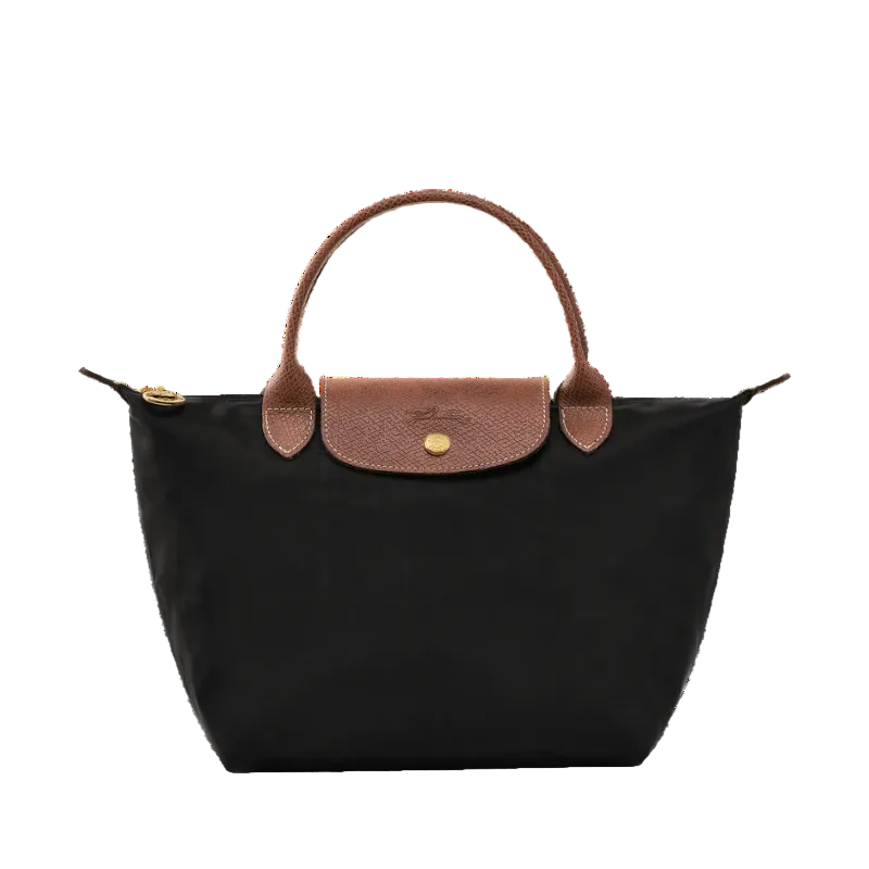 Medium tote bag in black with tan leather flap, front view