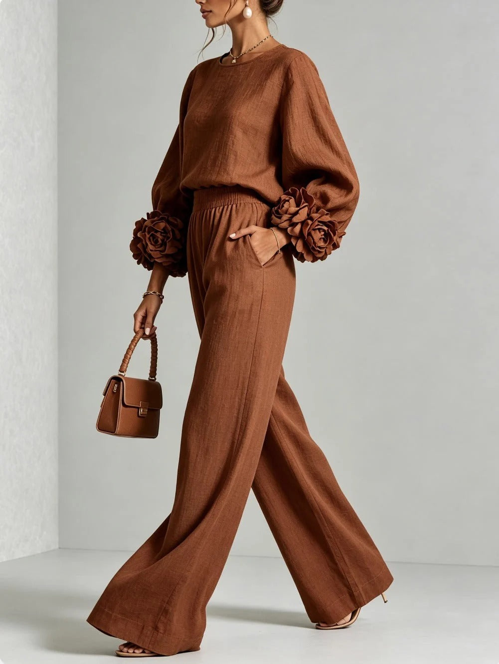 Penelope floral appliqué two-piece set in brown, side walking view