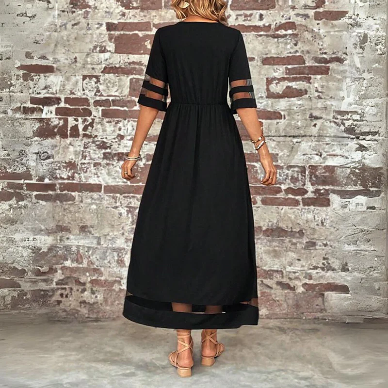 Cerelia midi dress in black, back view showing gathered waist