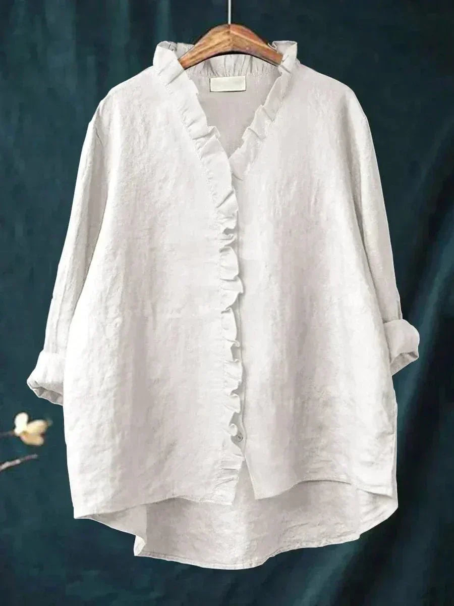 Thalia ruffled blouse in white, front view on hanger